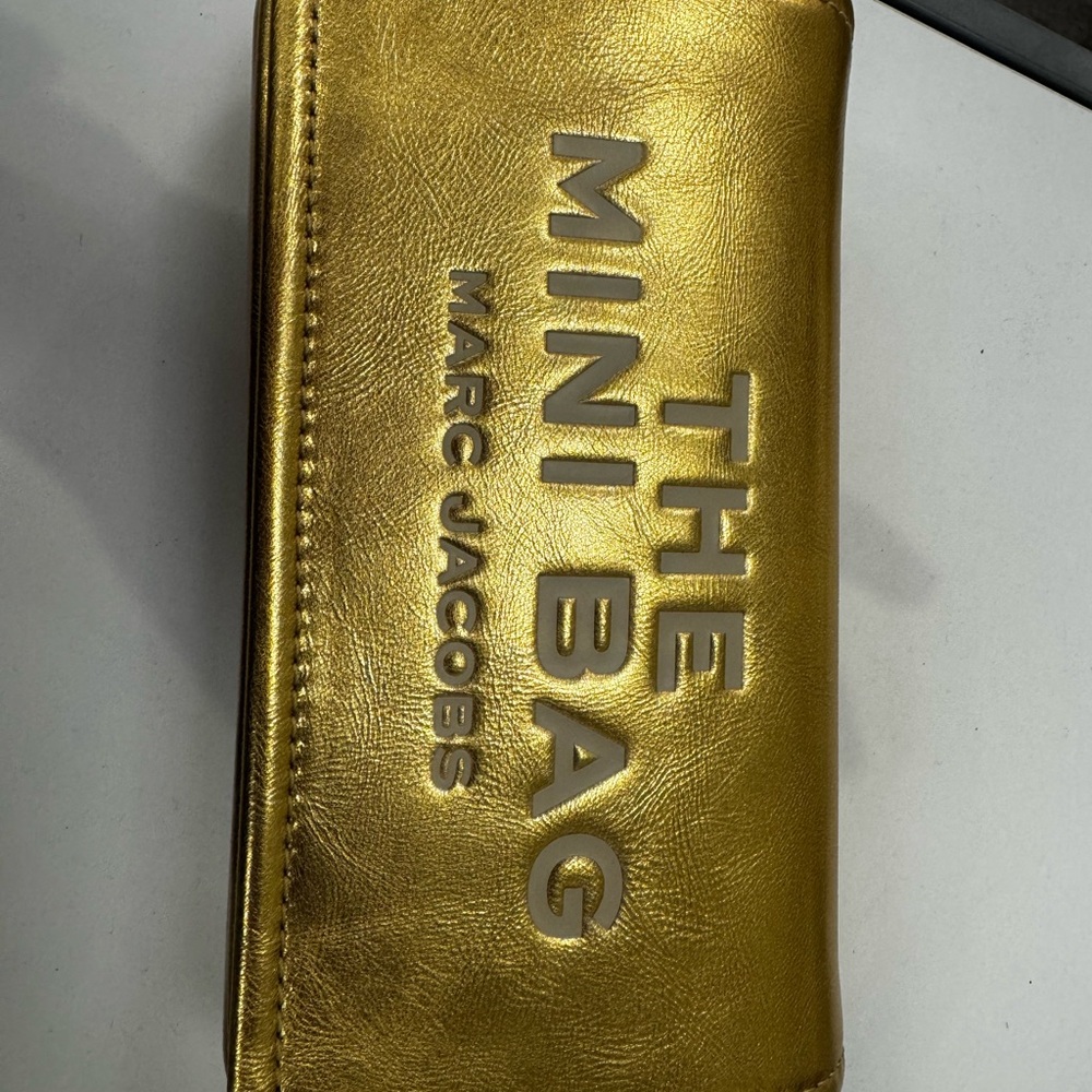 Marc Jacobs Gold Wallet with Luxurious Metallic Finish